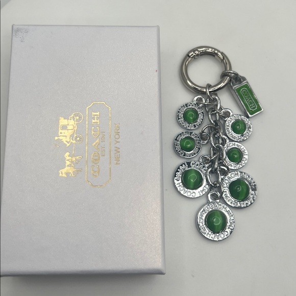 036. Coach Silver and Green Keychain. Box included.